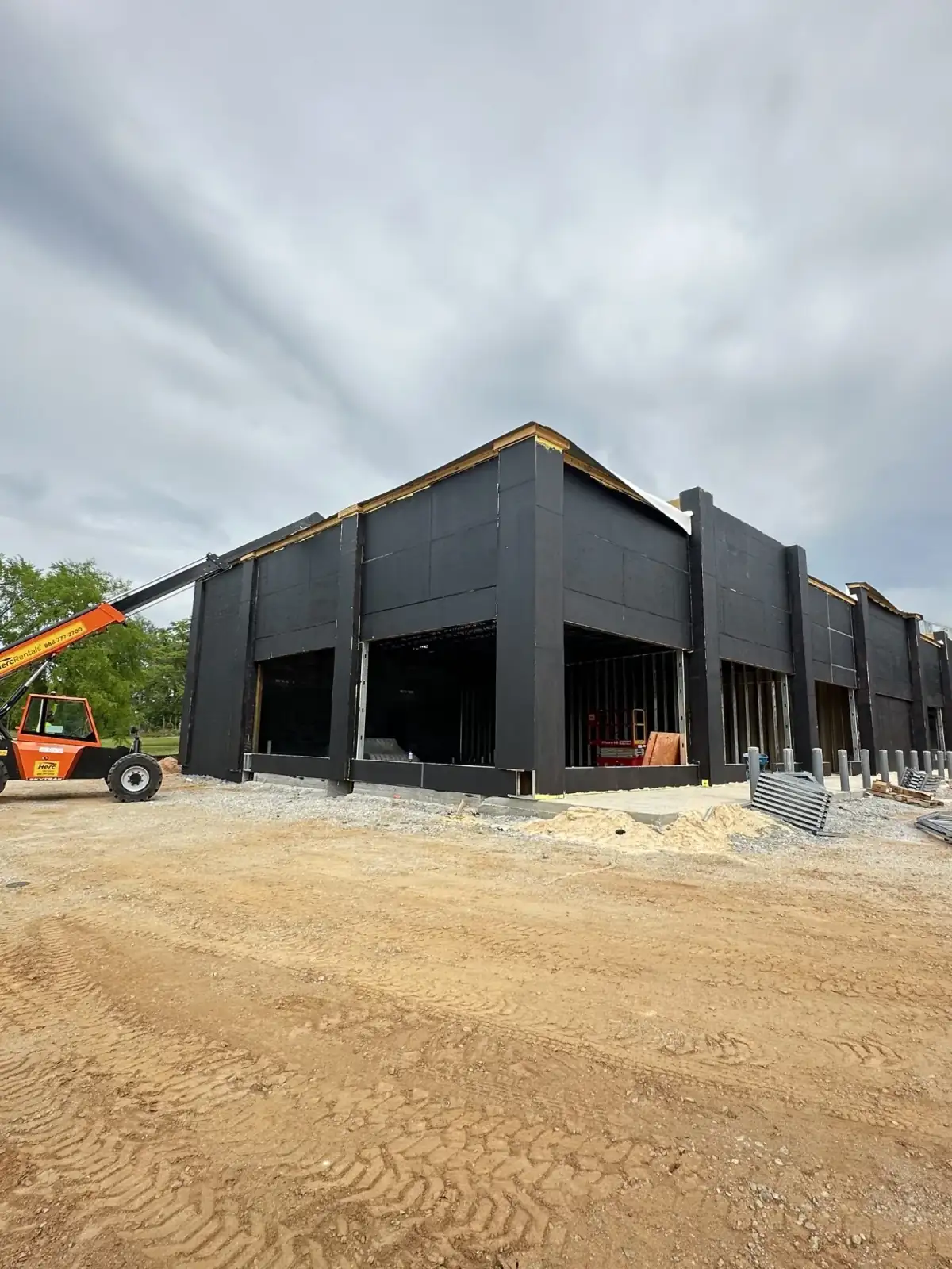 Commercial facade and storefront openings during active construction in Georgia