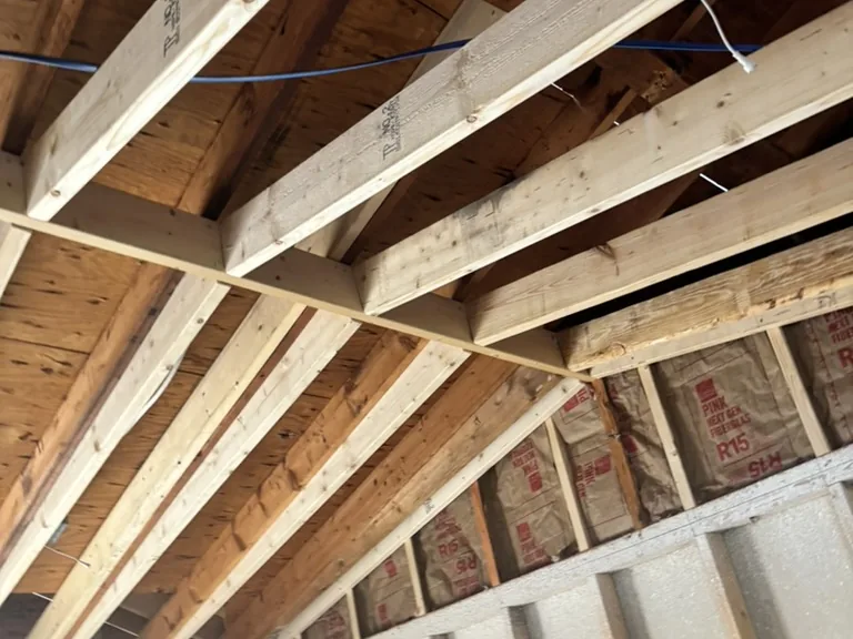 New roof rafters framed in over the damaged section